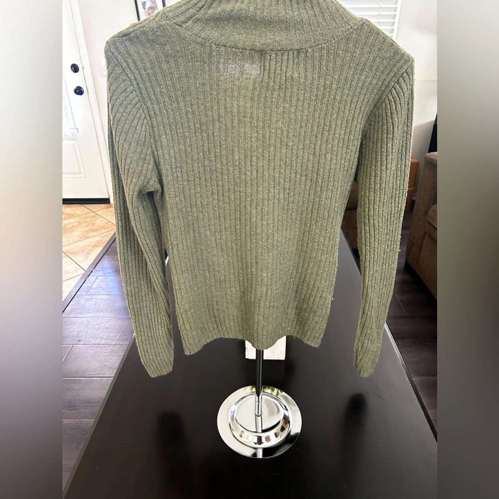 Long sleeve 94% Polyester and 4% Nylon and 2% Spandex